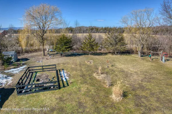 a living room with furniture and a area