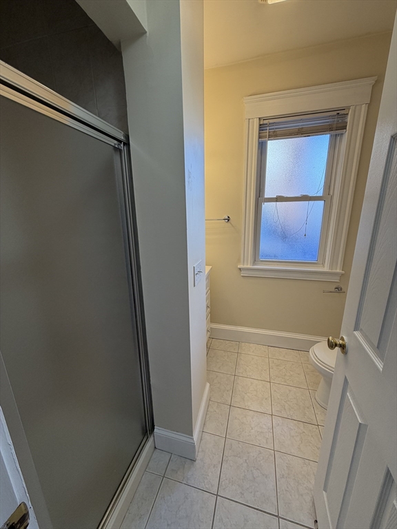 555 Heath Street, Unit 1 Brookline, MA 02467 - Photo 7 of 7 a view of an empty room