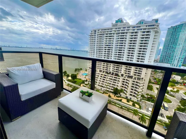 a view of an outdoor living room with furniture