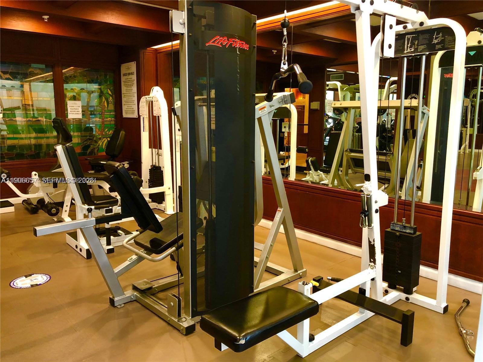 600 Northeast 36th Street, Unit 2011 Miami, FL 33137 - Photo 36 of 49 a view of a room with gym equipment