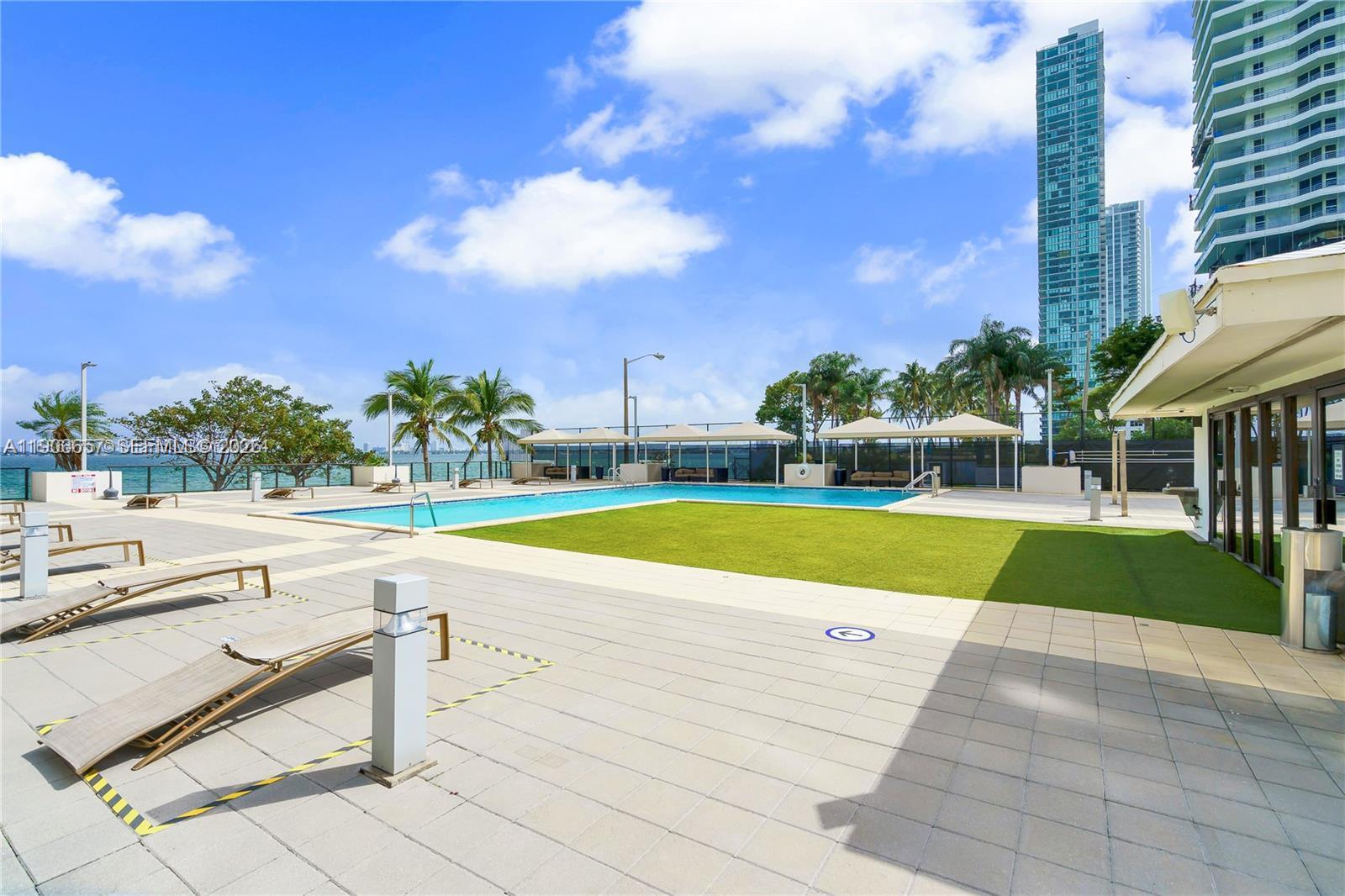 600 Northeast 36th Street, Unit 2011 Miami, FL 33137 - Photo 40 of 49 a view of outdoor space swimming pool and outdoor seating
