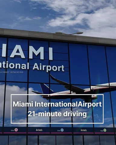 a front view of a building with retail shop and a couple of cars parked in front of it