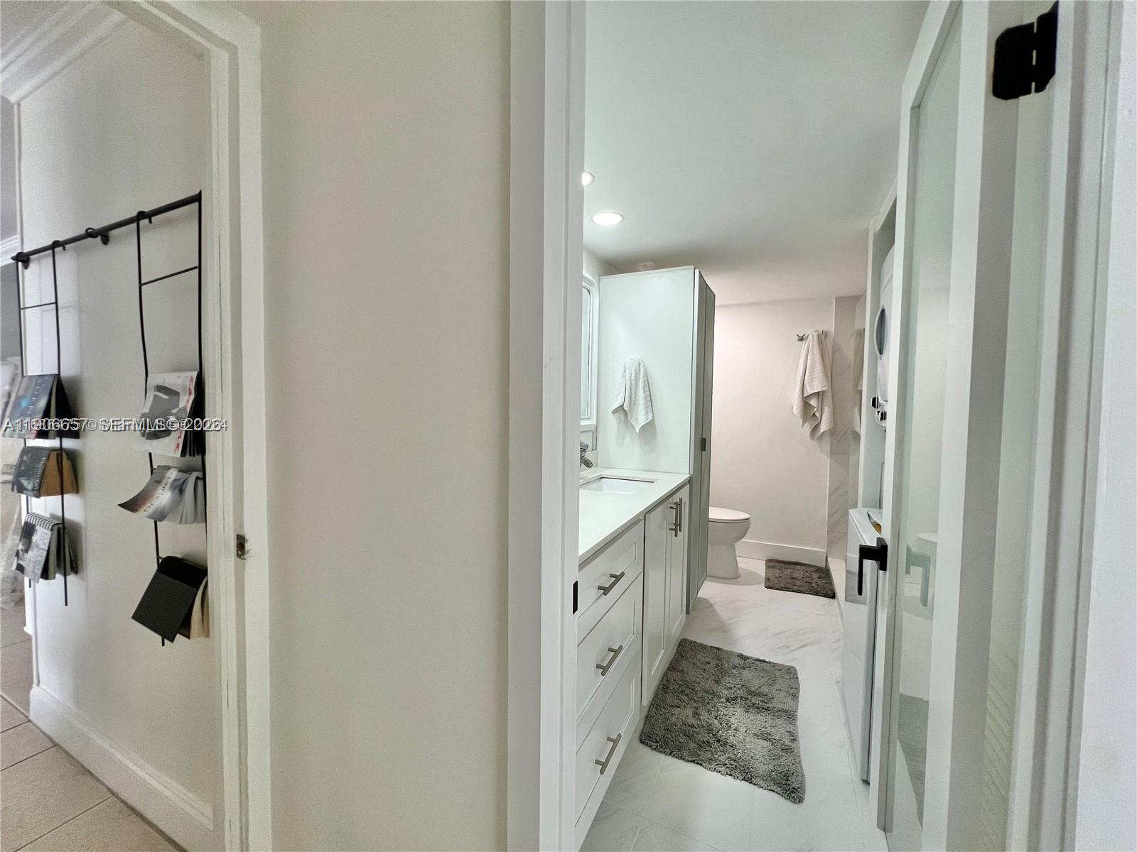 600 Northeast 36th Street, Unit 2011 Miami, FL 33137 - Photo 9 of 49 a bathroom with bathtub and shower
