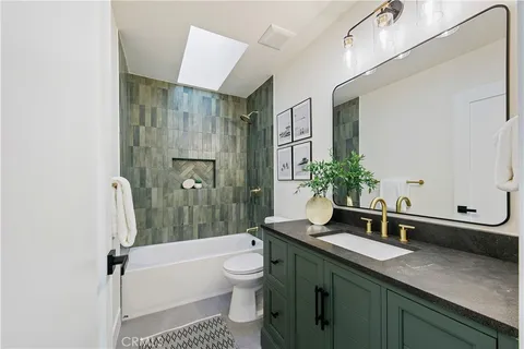 a bedroom with bed and a window