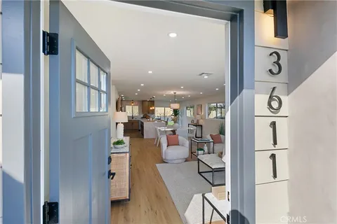 a view of a living room and dining room