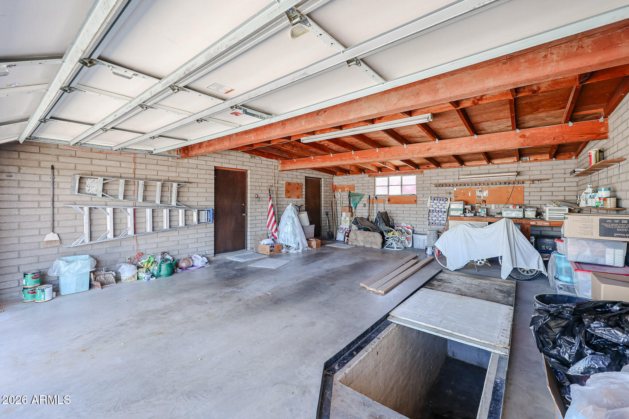 3039 East Charter Oak Road Phoenix, AZ 85032 - Photo 30 of 46 With In-Ground Mechanic's Pit