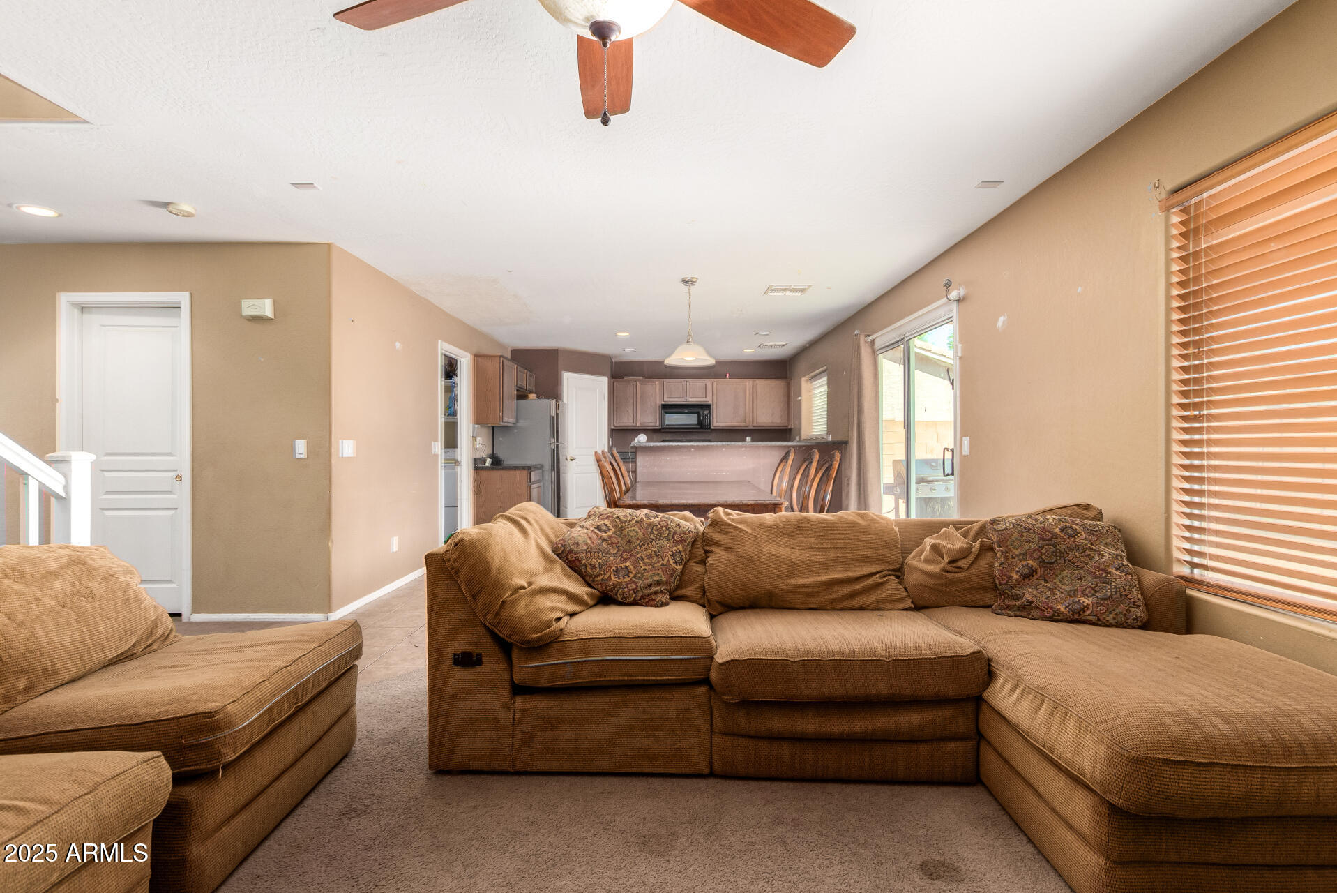 7229 West Crown King Road Phoenix, AZ 85043 - Photo 12 of 38 a living room with furniture and a large window