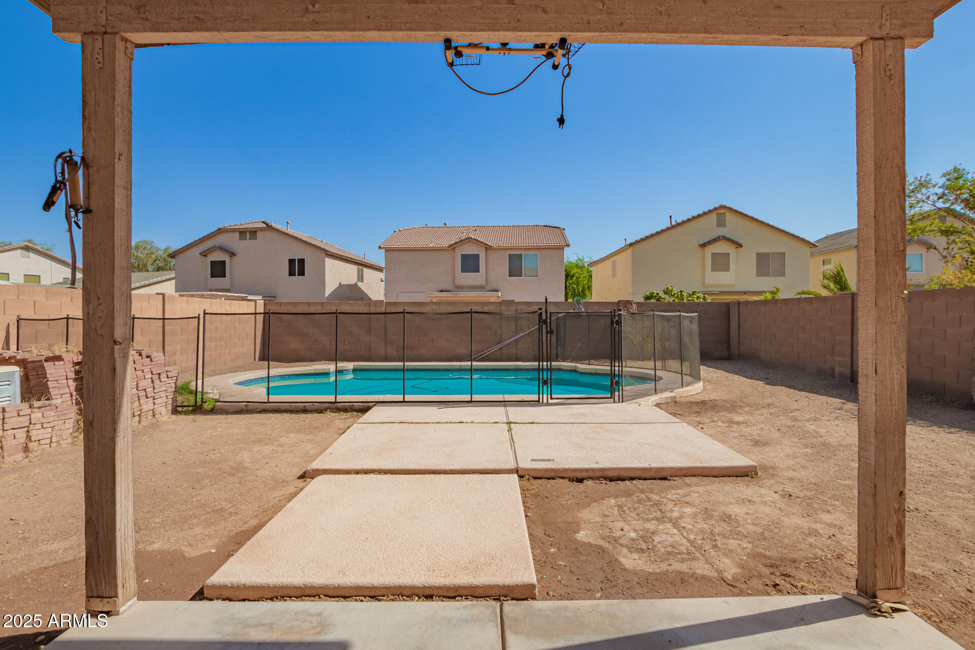 7229 West Crown King Road Phoenix, AZ 85043 - Photo 34 of 38 a front view of a house with a yard and garage