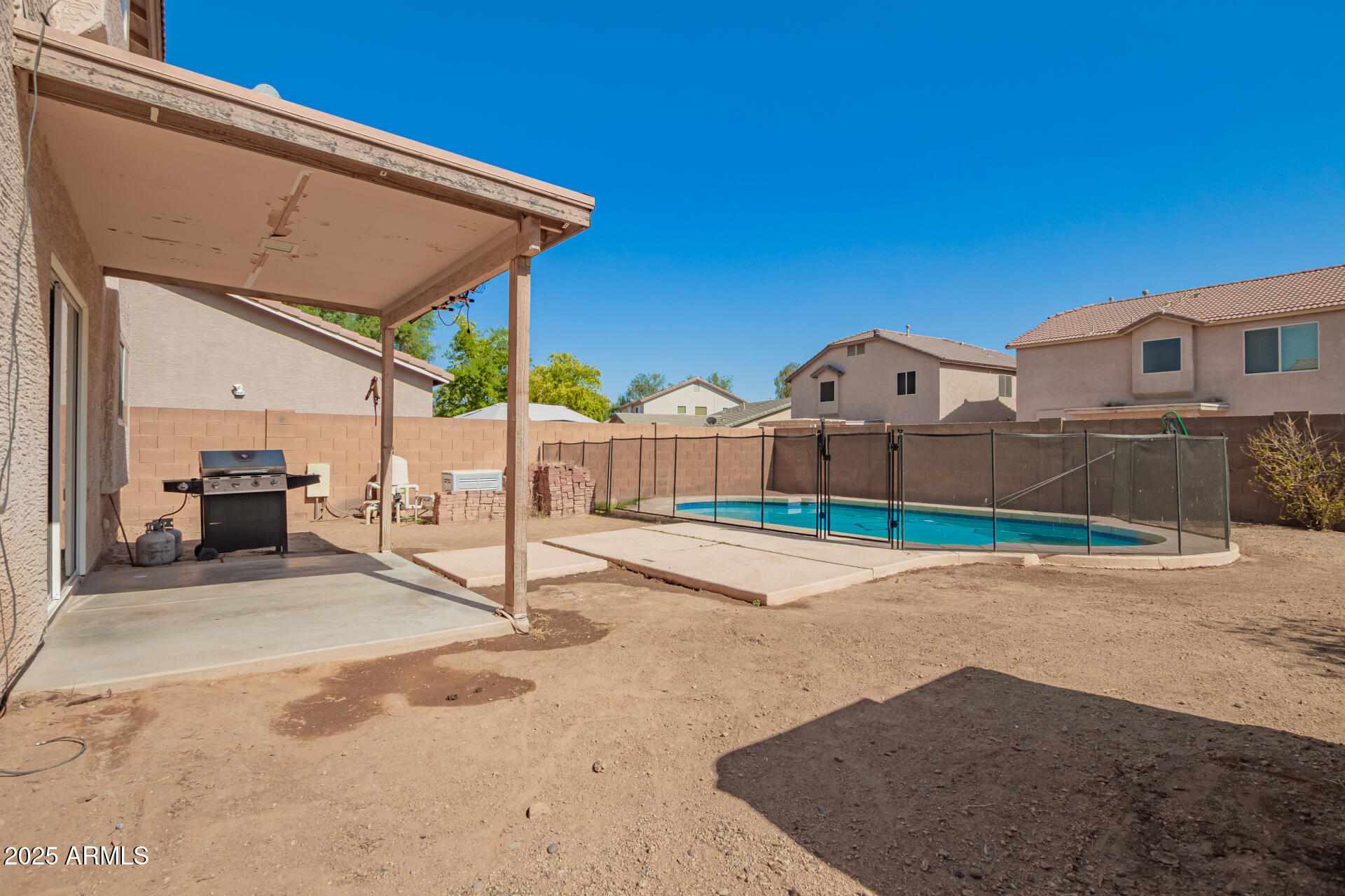 7229 West Crown King Road Phoenix, AZ 85043 - Photo 36 of 38 a view of a house with backyard
