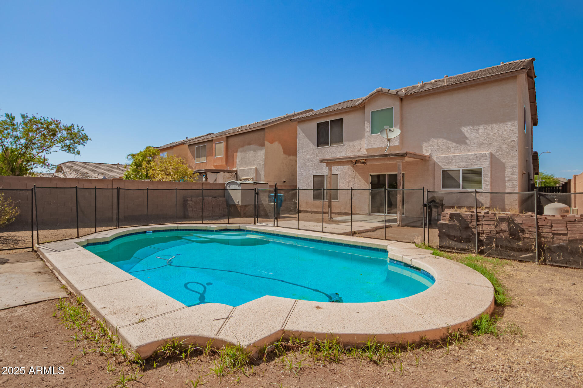 7229 West Crown King Road Phoenix, AZ 85043 - Photo 37 of 38 a view of a house with swimming pool
