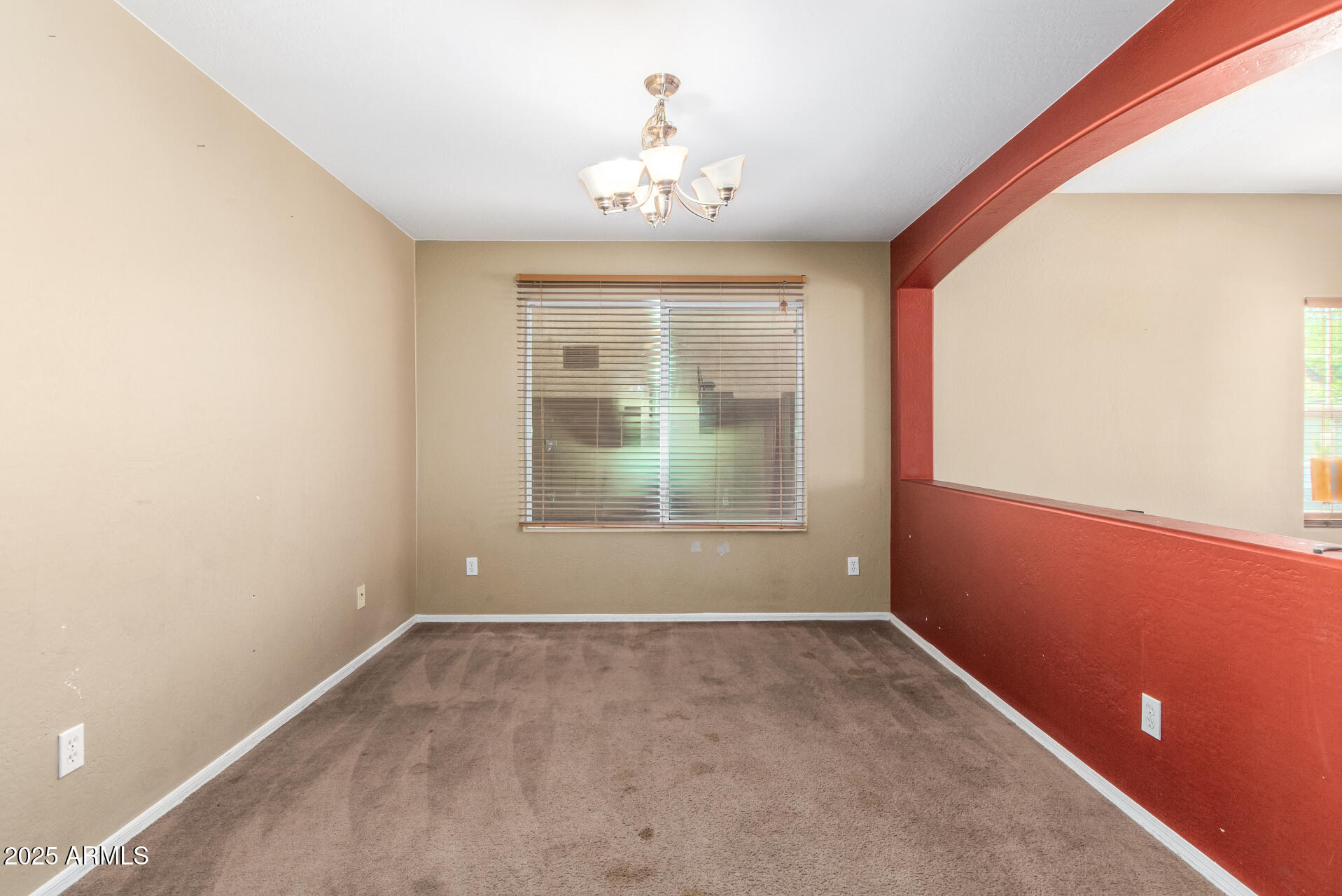 7229 West Crown King Road Phoenix, AZ 85043 - Photo 9 of 38 an empty room with a window