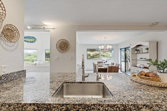 101 Shell Road, Unit 102 Watsonville, CA 95076 - Photo 11 of 34 a kitchen with a sink a counter top space and a window