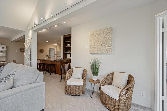 101 Shell Road, Unit 102 Watsonville, CA 95076 - Photo 15 of 34 a living room with furniture and a table