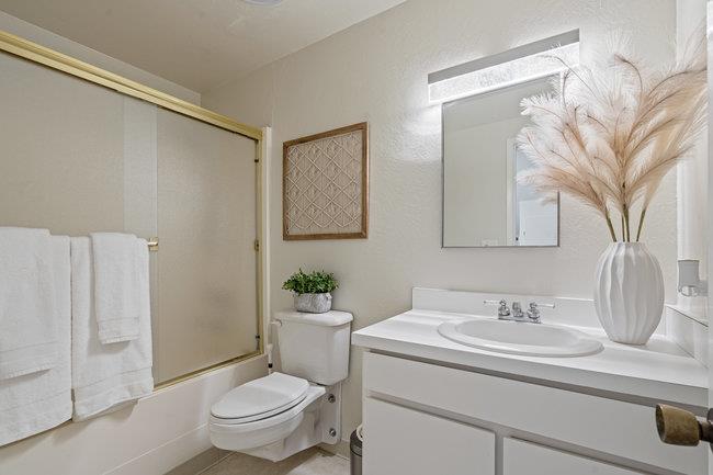 101 Shell Road, Unit 102 Watsonville, CA 95076 - Photo 23 of 34 a bathroom with a sink toilet and shower