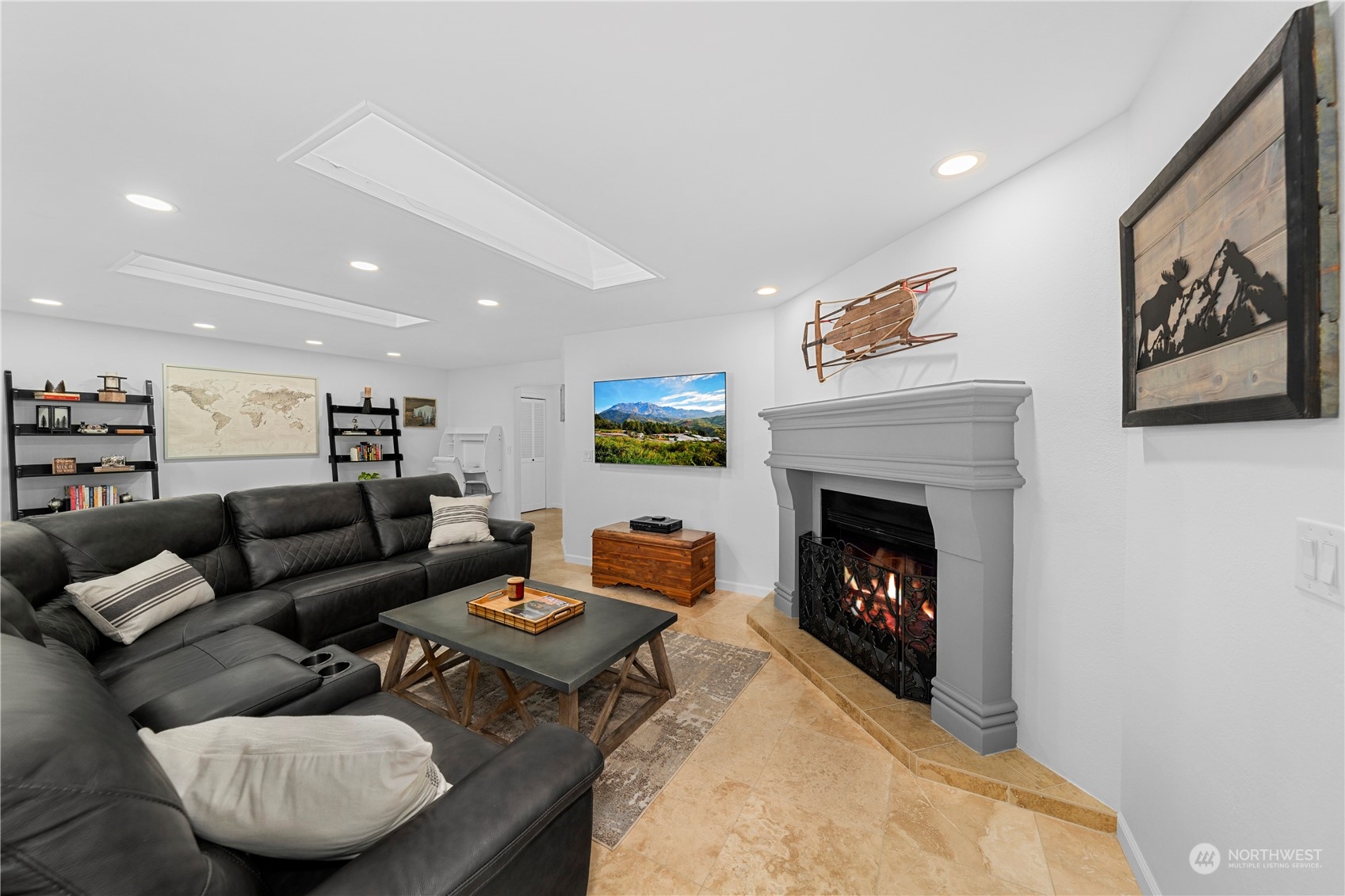 9151 Icicle Road, Unit E Leavenworth, WA 98826 - Photo 11 of 40 a living room with furniture and a fireplace