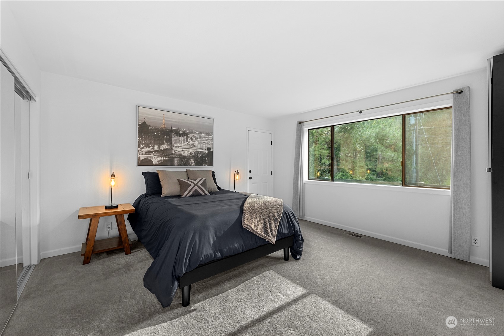 9151 Icicle Road, Unit E Leavenworth, WA 98826 - Photo 13 of 40 a living room with a bed furniture and a window
