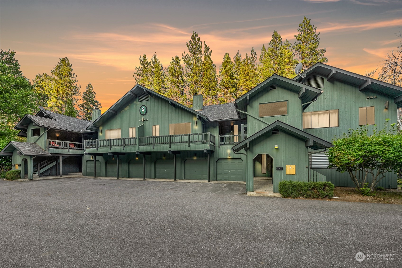 9151 Icicle Road, Unit E Leavenworth, WA 98826 - Photo 25 of 40 a view of house with a yard and potted plants