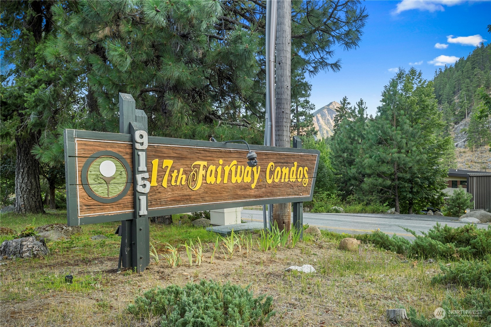 9151 Icicle Road, Unit E Leavenworth, WA 98826 - Photo 29 of 40 a sign that is on a brick wall