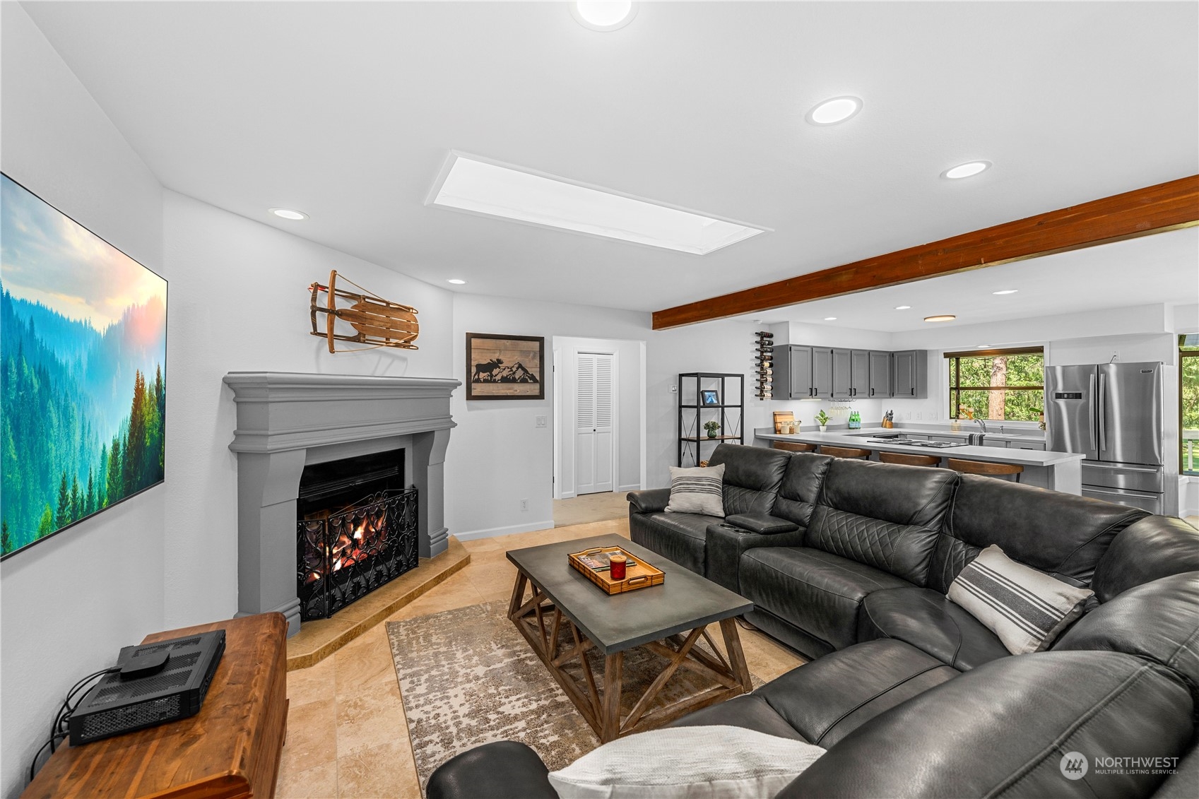 9151 Icicle Road, Unit E Leavenworth, WA 98826 - Photo 9 of 40 a living room with furniture and a fireplace
