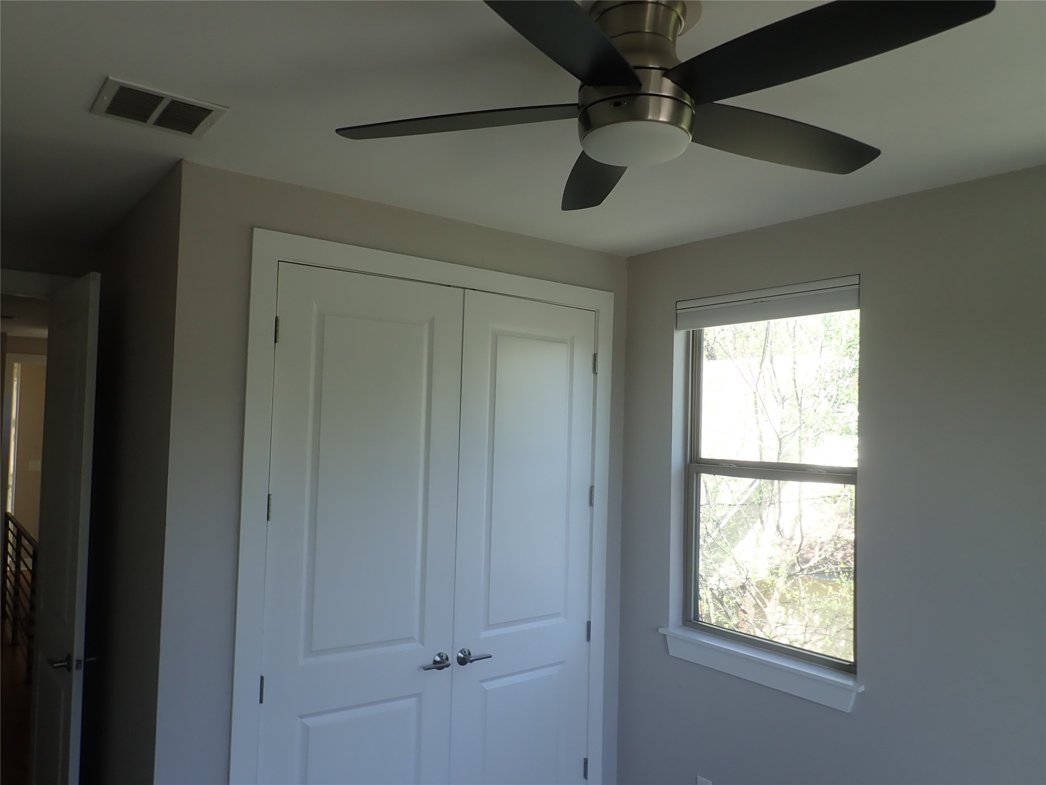 2912 East 14th Street, Unit A Austin, TX 78702 - Photo 27 of 27 Bedroom with baseboards and dark wood-type flooring