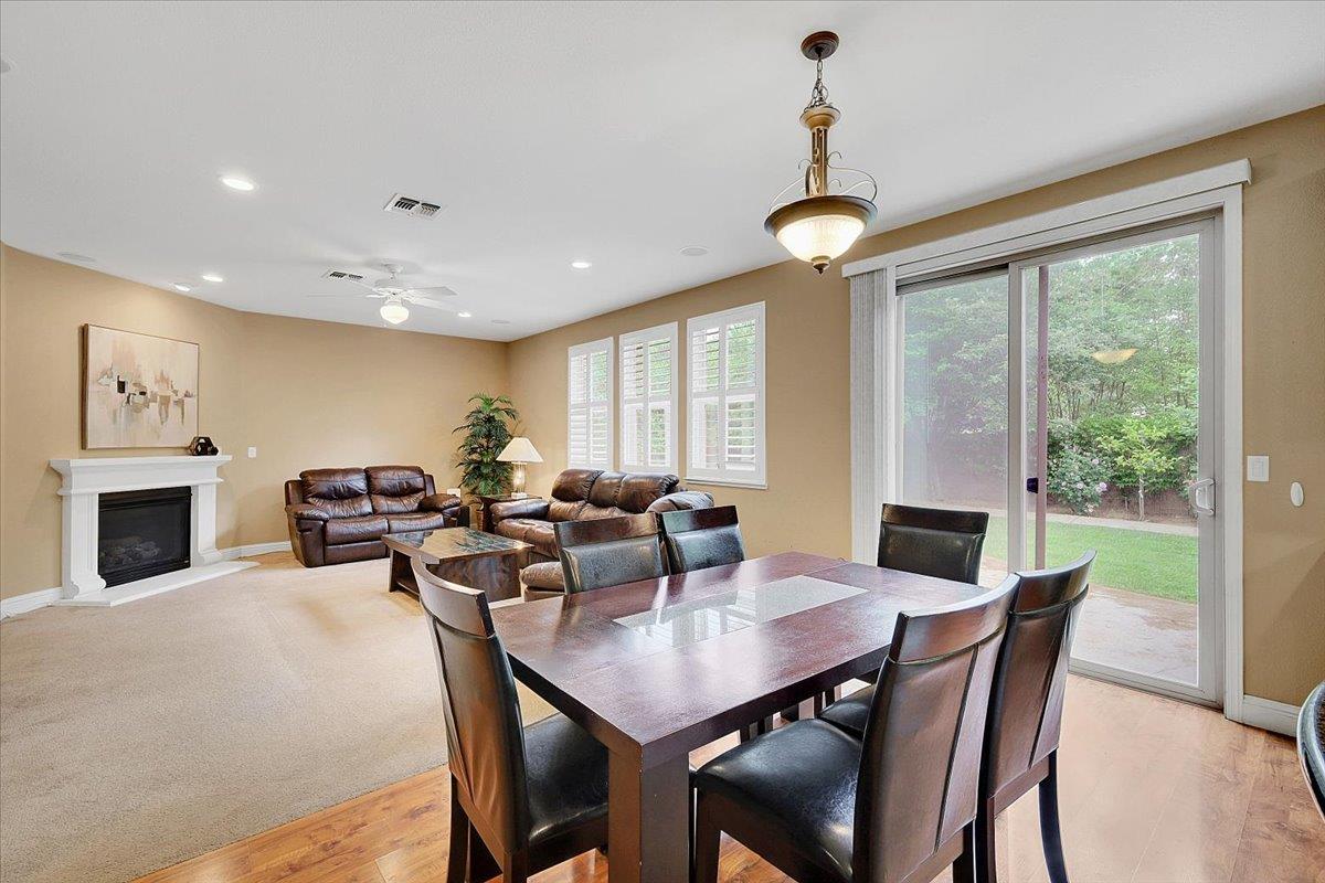 10022 Spring View Way Elk Grove, CA 95757 - Photo 22 of 54 a view of a dining room with furniture window and outside view