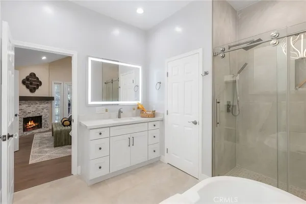 a view of a bathroom with a glass door and glass door