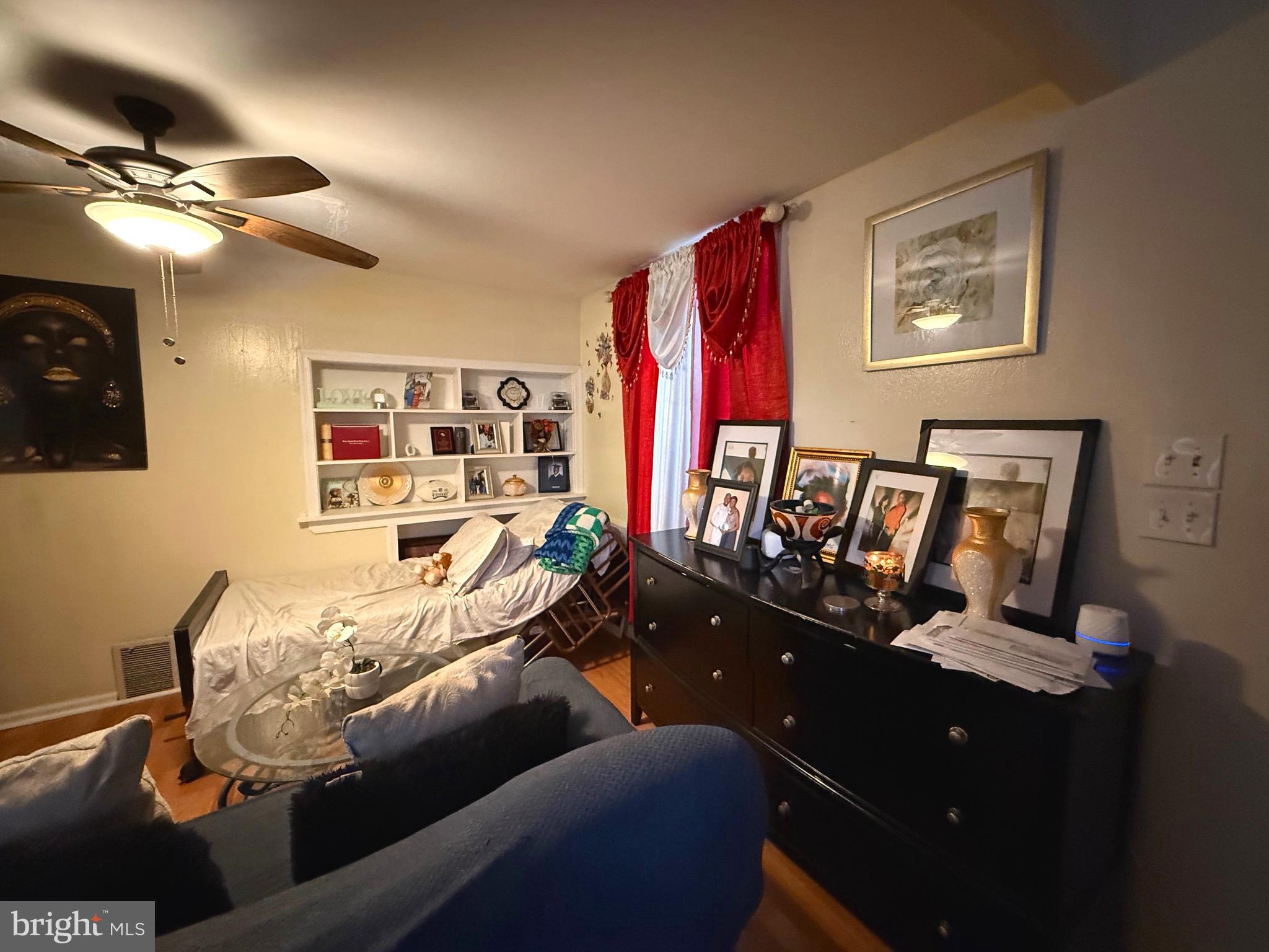 212 North Maple Avenue Lansdowne, PA 19050 - Photo 11 of 29 a living room with furniture and a flat screen tv