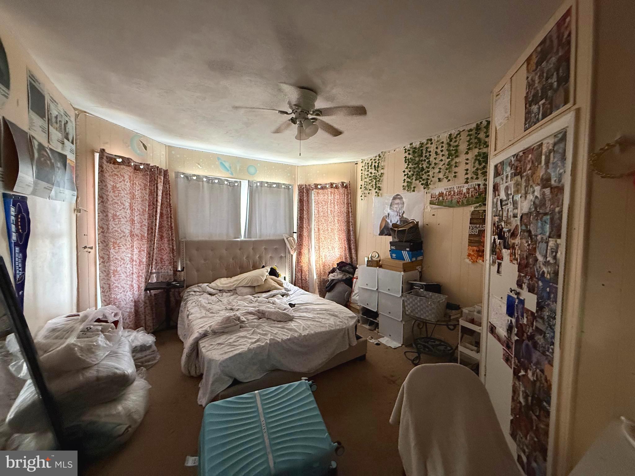 212 North Maple Avenue Lansdowne, PA 19050 - Photo 15 of 29 a bedroom that has a bed and a chair