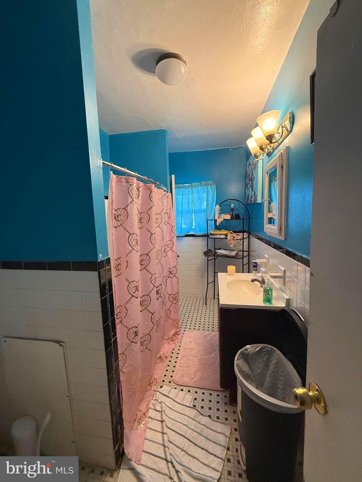 212 North Maple Avenue Lansdowne, PA 19050 - Photo 16 of 29 a bathroom with a sink and a mirror