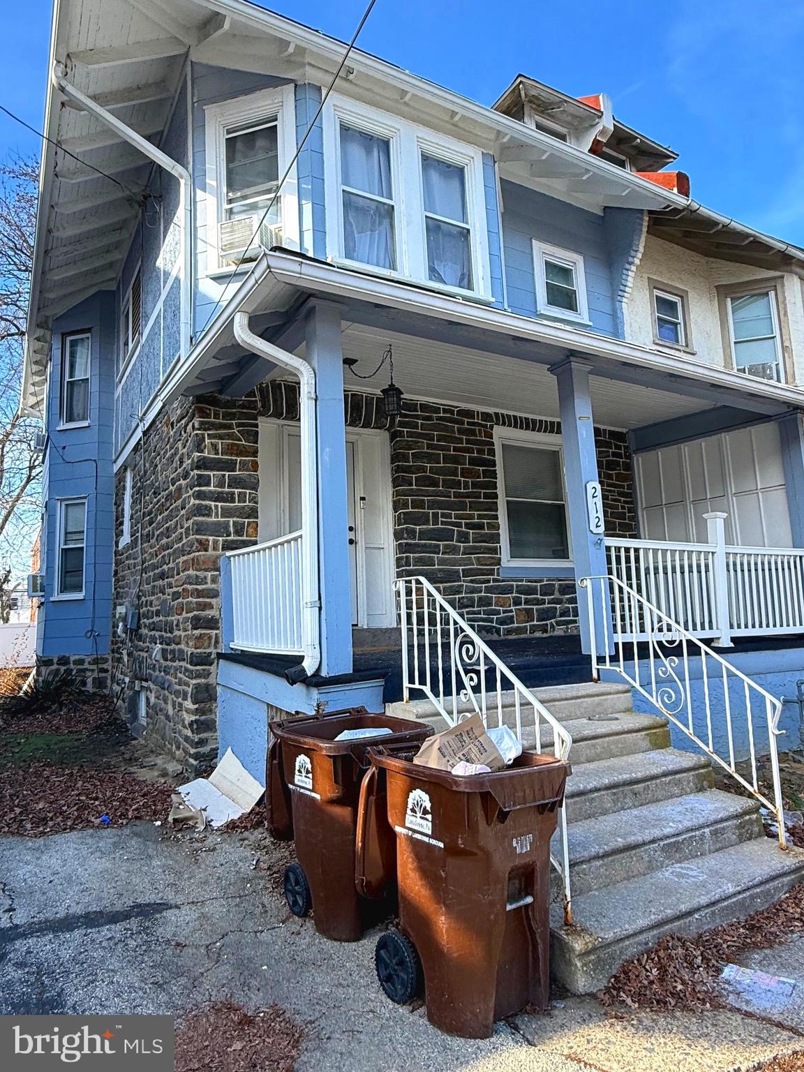 212 North Maple Avenue Lansdowne, PA 19050 - Photo 2 of 29 a view of a house with a large window and wooden fence