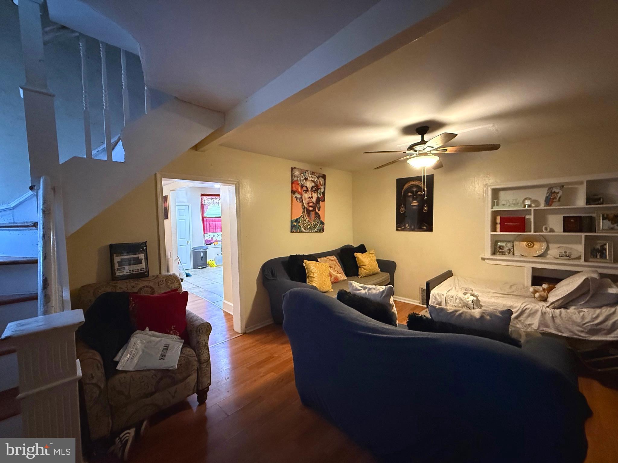 212 North Maple Avenue Lansdowne, PA 19050 - Photo 7 of 29 a living room with furniture and a lamp