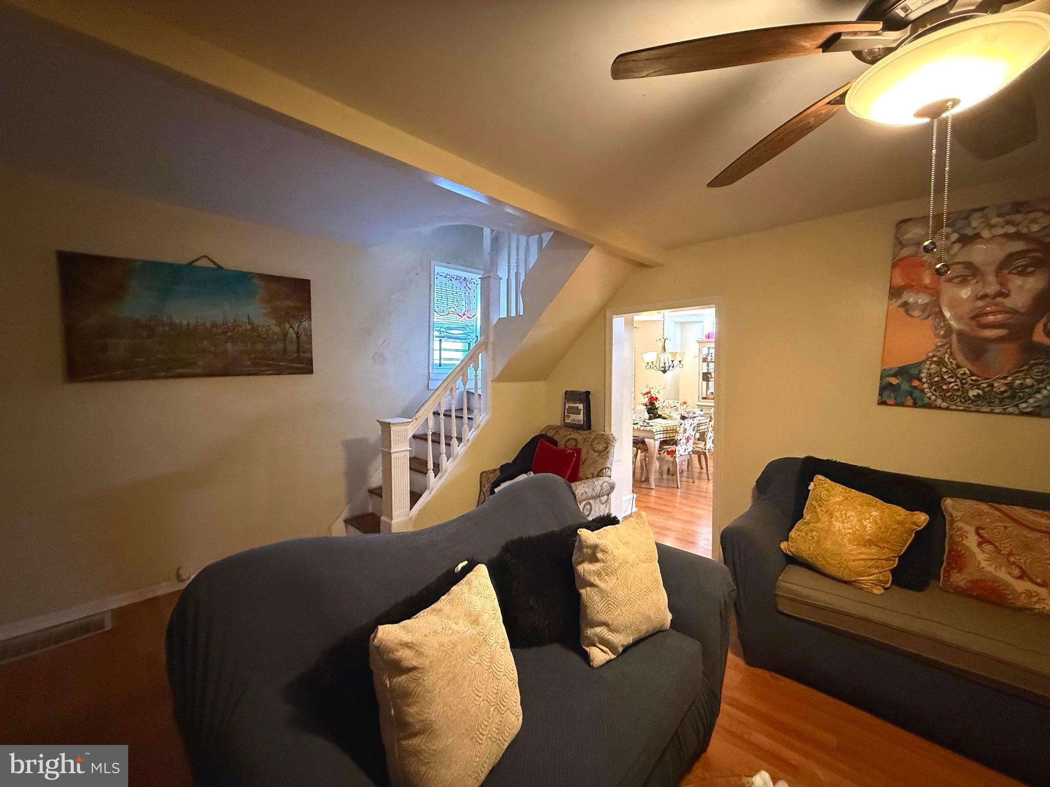 212 North Maple Avenue Lansdowne, PA 19050 - Photo 8 of 29 a living room with furniture and a flat screen tv