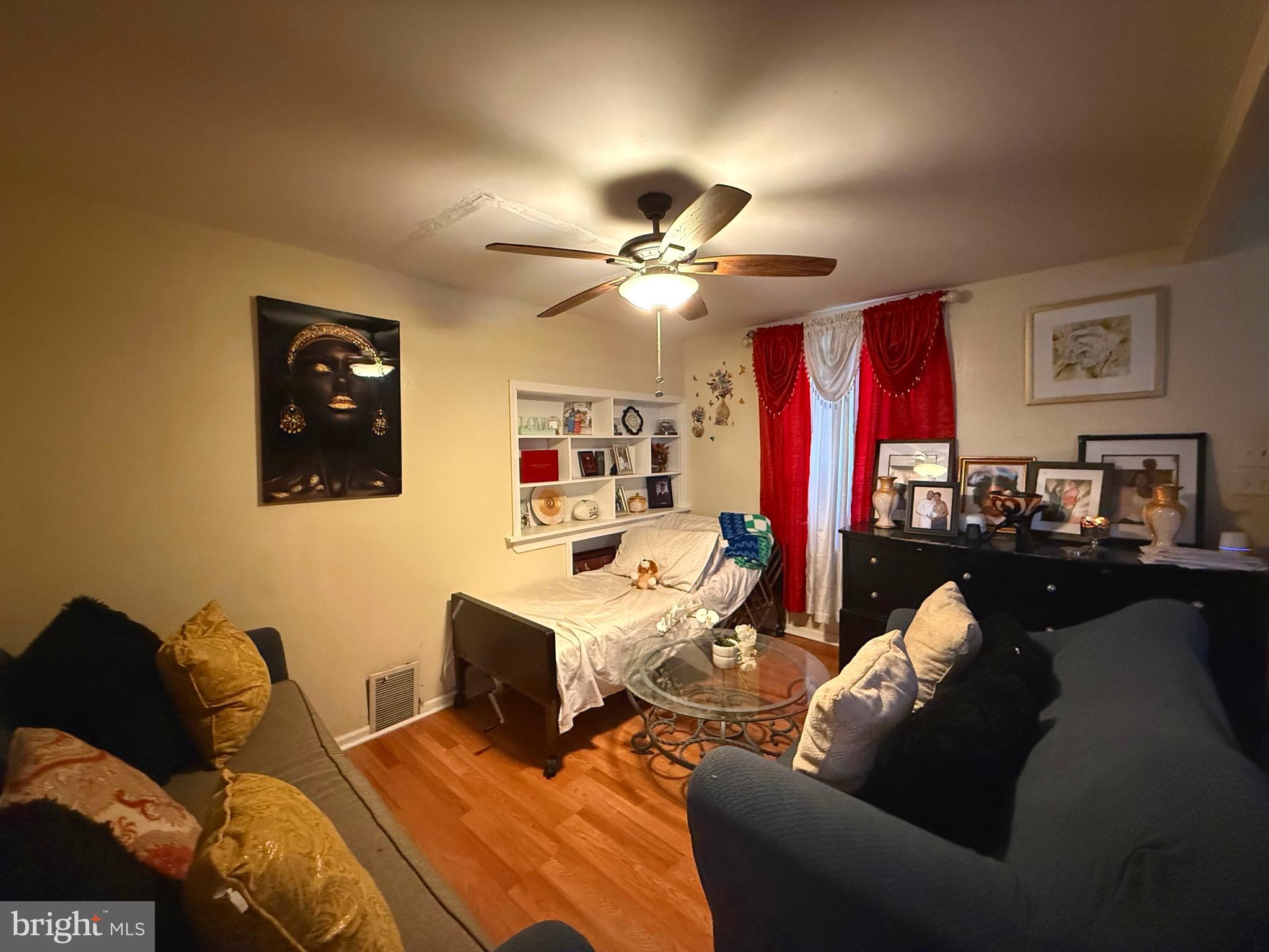 212 North Maple Avenue Lansdowne, PA 19050 - Photo 10 of 29 a living room with furniture and a chandelier