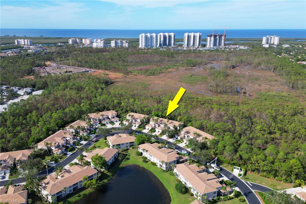 849 Carrick Bend Circle, Unit 202 Naples, FL 34110 - Photo 20 of 20 a view of a lake