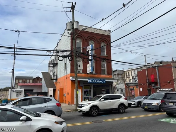 a view of a car parked in front of a building
