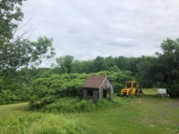 1007 Petersham Road Hardwick, MA 01037 - Photo 11 of 33 a backyard of a house with table and chairs