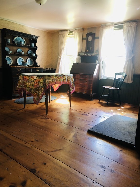 1007 Petersham Road Hardwick, MA 01037 - Photo 21 of 33 a living room with furniture and a table