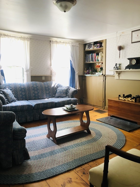 1007 Petersham Road Hardwick, MA 01037 - Photo 25 of 33 a living room with furniture rug and window