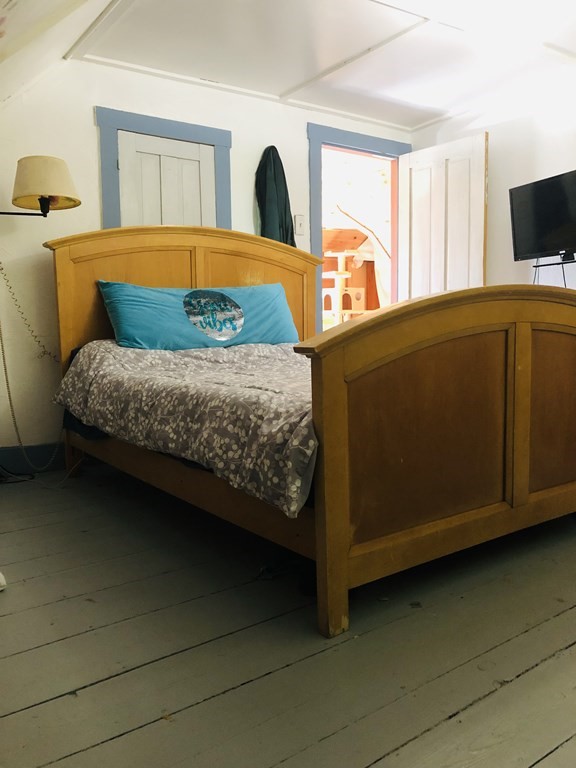 1007 Petersham Road Hardwick, MA 01037 - Photo 29 of 33 a bedroom with a bed and window