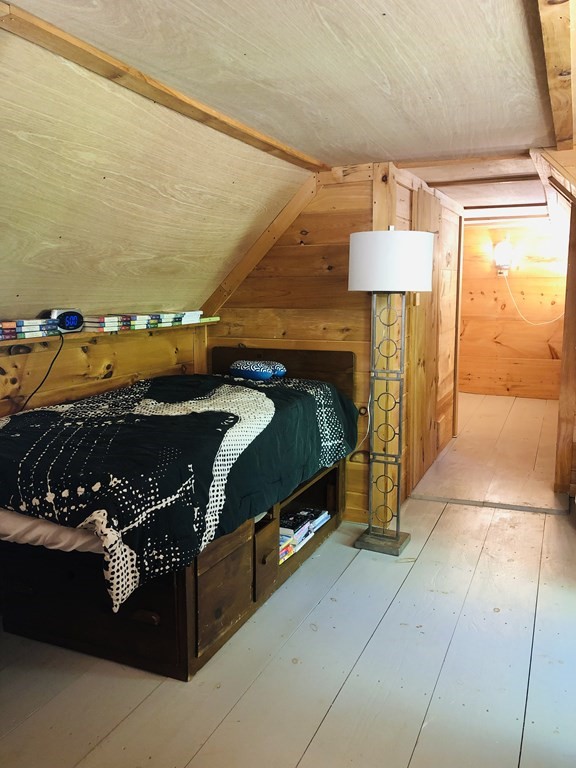1007 Petersham Road Hardwick, MA 01037 - Photo 30 of 33 a bedroom with a bed and a walk in closet