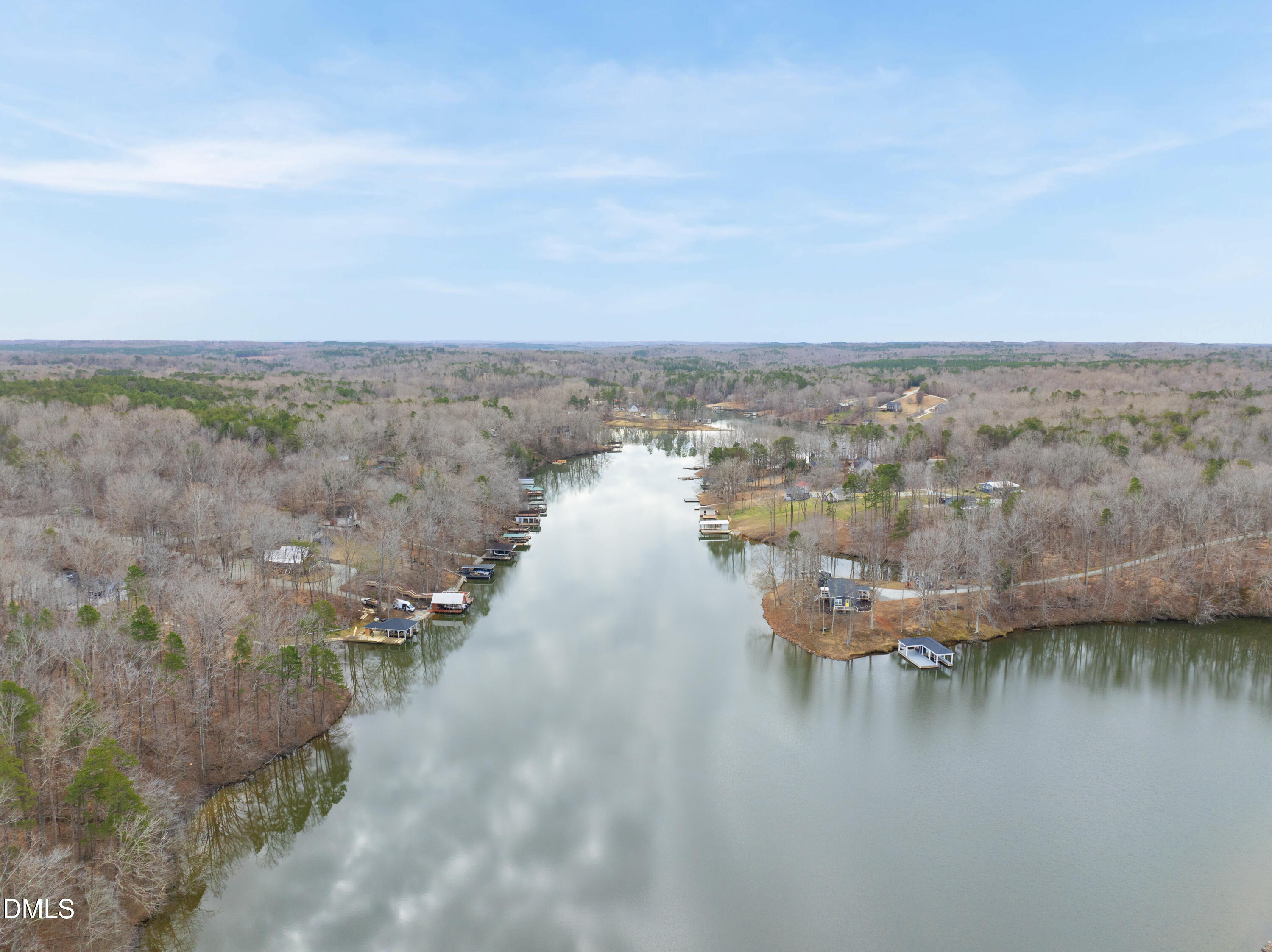 303 Hidden Hills Road Roxboro, NC 27574 - Photo 12 of 39 a view of a lake with outdoor space