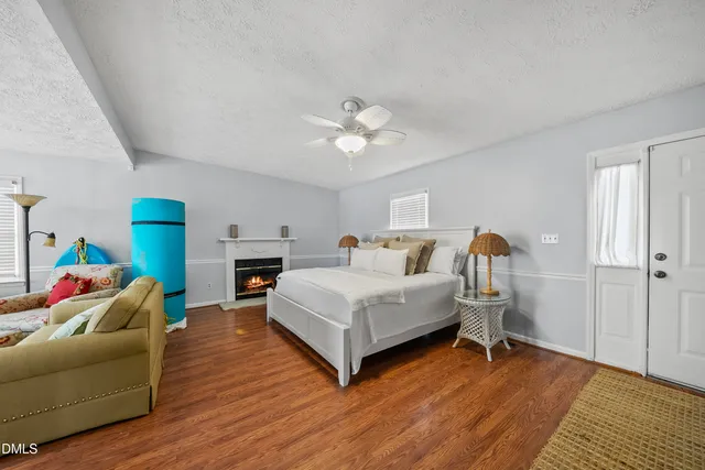 a bathroom with a sink mirror and toilet