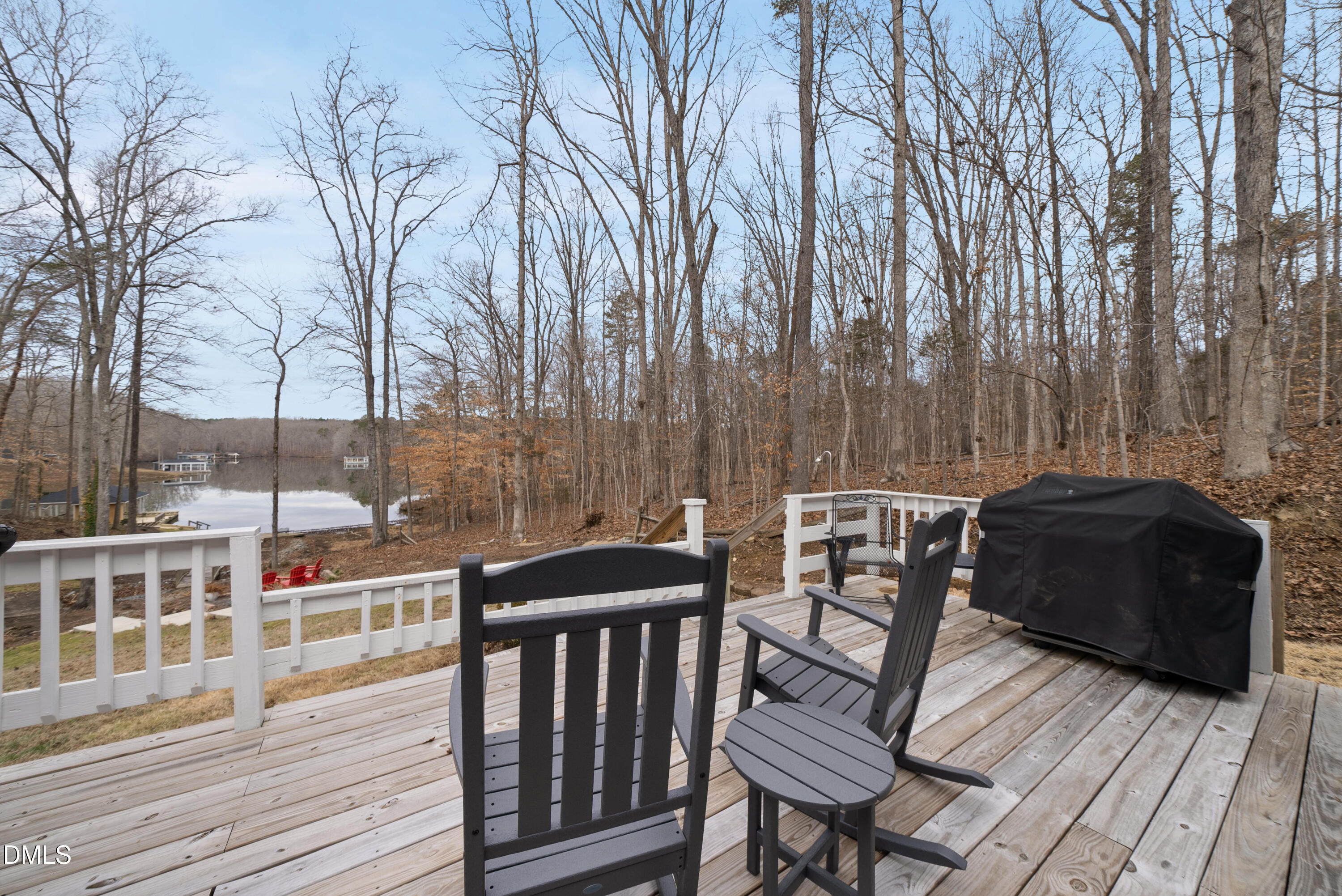 303 Hidden Hills Road Roxboro, NC 27574 - Photo 38 of 39 a view of a chairs on the deck