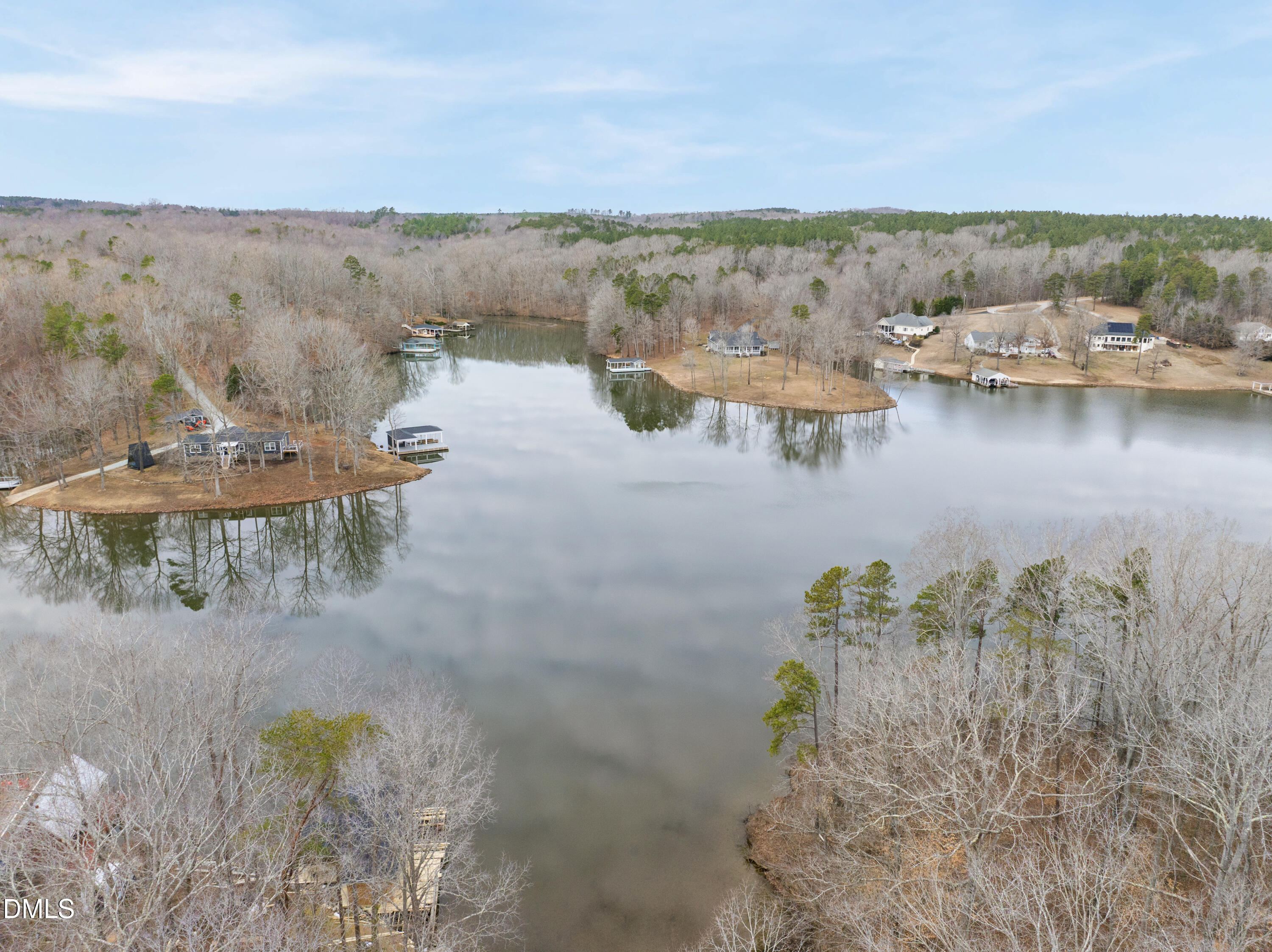 303 Hidden Hills Road Roxboro, NC 27574 - Photo 9 of 39 a view of a lake with mountains in the background