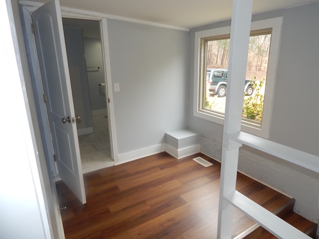 177 Seneca Creek Road Seneca, SC 29678 - Photo 20 of 26 This versatile interior space offers rich wood flooring and a bright window with abundant natural light.