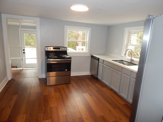 177 Seneca Creek Road Seneca, SC 29678 - Photo 26 of 26 This bright kitchen features new flooring and modern appliances, perfect for everyday living.