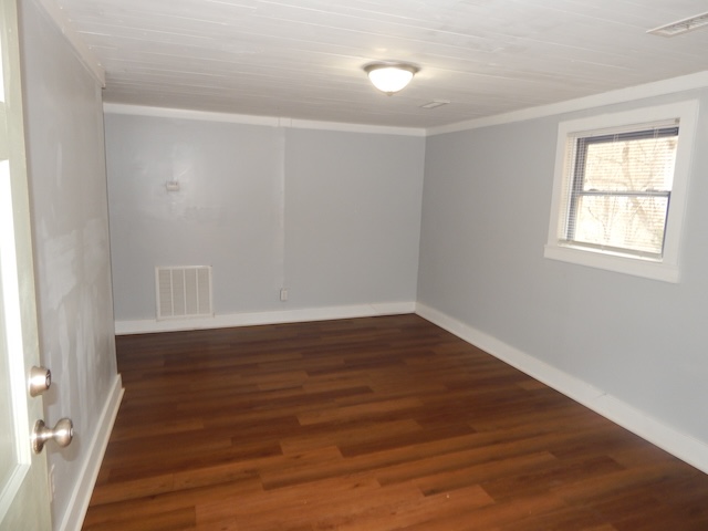 177 Seneca Creek Road Seneca, SC 29678 - Photo 9 of 26 This versatile room features hardwood floors and a bright window, offering a comfortable space.