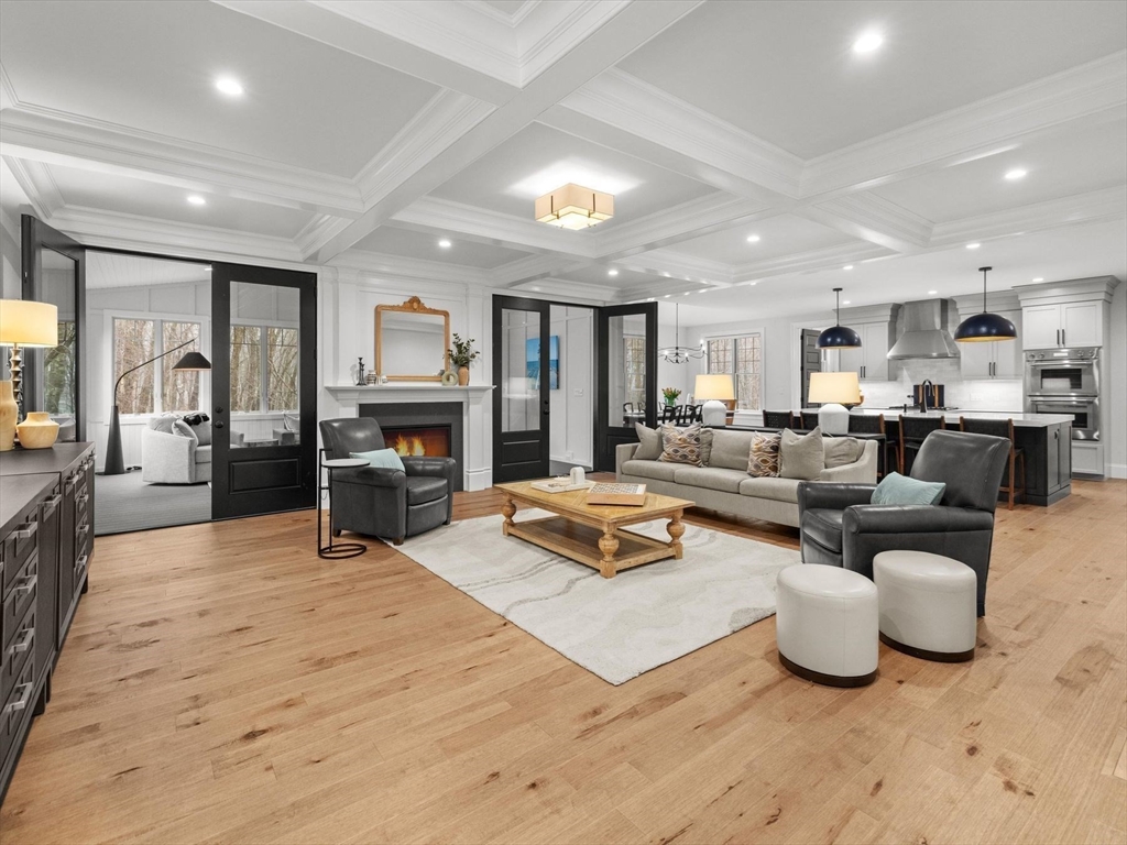 15 Quick Farm Road Westborough, MA 01581 - Photo 11 of 40 a living room with furniture and a fireplace