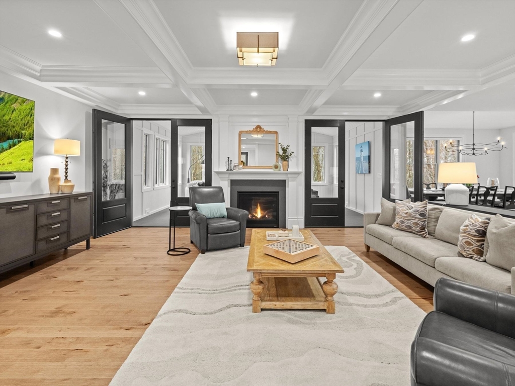 15 Quick Farm Road Westborough, MA 01581 - Photo 12 of 40 a living room with furniture and a fireplace