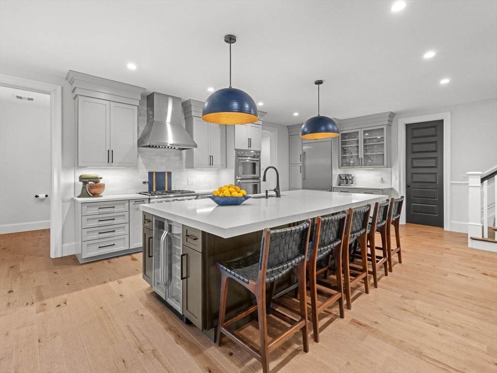 15 Quick Farm Road Westborough, MA 01581 - Photo 13 of 40 an open kitchen with a table and chairs in it